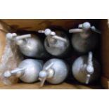 Six vintage soda syphons with later mottled gray paint effect