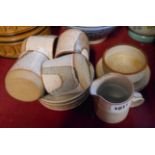 A Studio Pottery part coffee set, comprising four cups and saucers, cream jug and sugar bowl