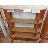 A 1.42m vintage pine and mixed wood open three shelf shop display unit with curved ends and