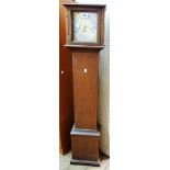 A vintage stained oak cased grandmother clock with decorative dial and floating escapement eight day
