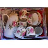 A box containing a Royal Stafford First Love pattern coffee set, comprising six cups and saucers,