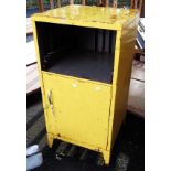 A vintage yellow painted metal cabinet - drawer missing