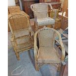 A cane framed conservatory elbow chair - sold with two other cane elbow chairs (1 with minor