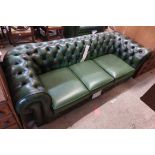 A 2.05m Thomas Lloyd three seater leather Chesterfield settee with button back upholstery, set on