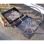 A pair of wrought iron garden pedestal plinths - sold with a similar flower basket example