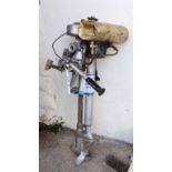 A vintage Seagull two stroke outboard boat motor