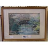 A small gilt framed watercolour, depicting a river landscape