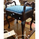 A Victorian style mahogany locker piano stool with new upholstery, set on cabriole legs with pad