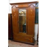 A 1.23m Edwardian inlaid mahogany Sheraton Revival single wardrobe with hanging space enclosed by
