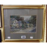 Leyton Forbes: a gilt framed watercolour, depicting rural cottages - signed - 15cm X 22cm