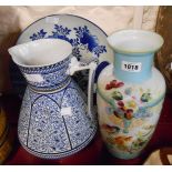 A Victorian blue and white toilet jug - sold with a large blue painted Japanese porcelain charger