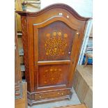A 1.2m reproduction mahogany wardrobe with incised canted sides, stencilled decoration and hanging