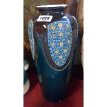 An Eichwald Secessionist Art Nouveau pottery vase decorated with swagged panels of MacIntosh style
