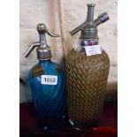 A vintage blue glass soda syphon with etched decoration for Ferguson's of Plymouth - sold with a