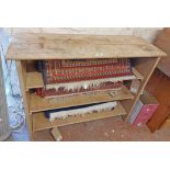 A 99cm stripped pine three shelf open bookshelf