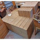 A 1.5m square slatted pine shop display stage - sold with two smaller display stands