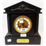 A late Victorian black slate cased mantle clock of architectural design with Mougin eight day gong