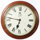 An early 20th Century stained oak cased dial wall timepiece, the 30cm diameter dial mark with