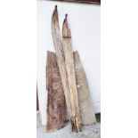 The front tips of a pair of vintage Norwegian wooden skis - sold with two carved wood panels