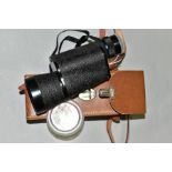A CASED MONOCULAR, 10 X 50 MARKED Empire Made and with Crown logo, appear complete with both dust