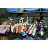 A COLLECTION OF SCENT BOTTLES/ATOMISERS AND RESIN MODELS OF LADIES SHOES, etc, including a purple