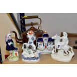 FOUR VICTORIAN STAFFORDSHIRE POTTERY FIGURES AND A VICTORIAN COPPER KETTLE, the Staffordshire