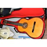 A JUAN ESTRUCH CLASSICAL GUITAR, made in Spain, with hard case (needs restringing)