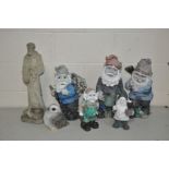 SEVEN GARDEN FIGURES including a composite religious figure, height 54cm, five resin dwarves and a