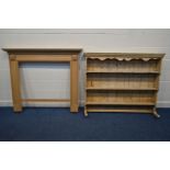 A CARVED PINE FIRE SURROUND, width 147cm x height 128cm together with a Victorian pine dresser top(