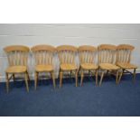 A SET OF SIX BEECH KITCHEN CHAIRS, two chairs altered and arms removed