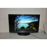 A PANASONIC TX-L37G20BA 37'' LCD TV with remote on stand