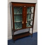 AN EDWARDIAN MAHOGANY AND MARQUETRY INLAID ASTRAGAL GLAZED TWO DOOR DISPLAY CABINET, on square