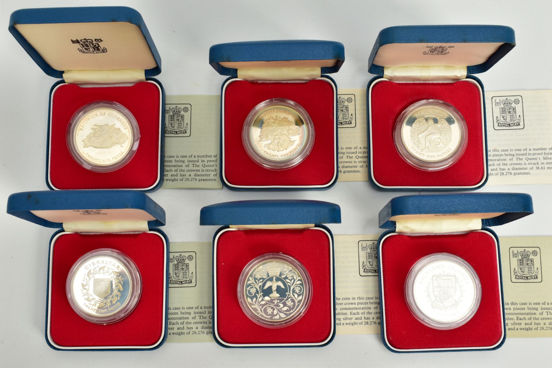 A SET OF SIX INDIVIDUALLY CASED 1952-1977 COMMEMORATIVE COINS, each with a design of the issuing - Image 2 of 2