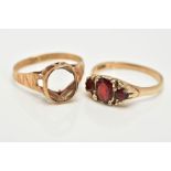 TWO 9CT GOLD RINGS, the first a graduated three stone oval cut garnet ring, within a scroll detailed