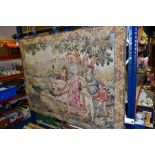 A MODERN MACHINED TAPESTRY OF FIGURES WITH FALCONS ON HORSEBACK, mounted on a wooden pole,