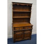 AN OLD CHARM OAK DRESSER, with two drawers, width 93cm x depth 44cm x height 175cm