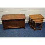 A REPRODUCTION OAK NEST OF THREE TABLES together with an oak blanket chest (2)