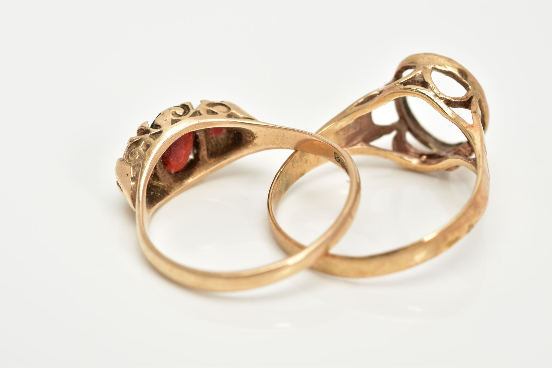 TWO 9CT GOLD RINGS, the first a graduated three stone oval cut garnet ring, within a scroll detailed - Image 3 of 3