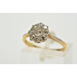 A DIAMOND CLUSTER RING, set with old cut diamonds, tapered shoulders, total estimated diamond weight