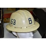 A VINTAGE EVEROAK SAFETY HELMET, glass fibre shell with adjustable head harness, appears complete