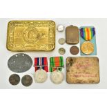 A 1914 PRINCESS MARY CHRISTMAS TIN AND CONTENTS, the brass tin containing a victory medal assigned