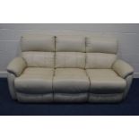 A CREAM LEATHER ELECTRIC RECLINING THREE SEATER SETTEE, width 210cm