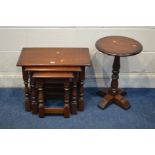 AN OLD CHARM OAK NEST OF THREE TABLES together with a circular topped wine table (2)