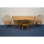 A 1950'S BLONDE ERCOL ELM AND BEECH MODEL 383 DROP LEAF DINING TABLE, on square tapering legs,