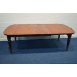 MAPLE AND CO, AN EDWARDIAN WALNUT WIND OUT/TELESCOPIC DINING TABLE, rounded ends, two additional