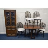 AN OLD CHARM OAK LEAD GLAZED CORNER CUPBOARD together with an oak square topped gate leg table and