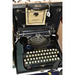 A CASED CORONA PORTABLE TYPEWRITER, appears complete and in fairly good condition, very minor