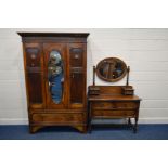 AN EARLY TO MID 20TH CENTURY OAK TWO PIECE BEDROOM SUITE, comprising a mirrored single door