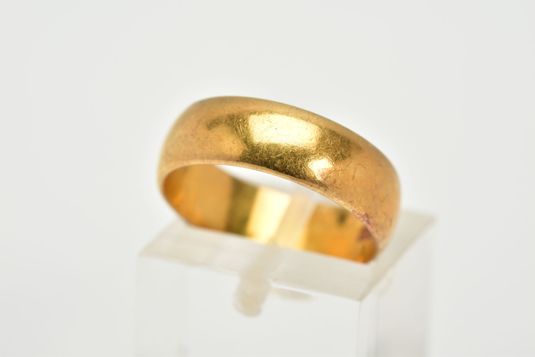 A 22CT GOLD WIDE WEDDING BAND, plain polished design, hallmarked 22ct gold Birmingham, ring size