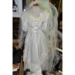 A PRONUPTIA DE PARIS WEDDING DRESS, size 12, 50% Nylon and 50% polyester, with veil and box,